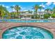 Relaxing hot tub nestled beside the pool at 8001 Cool Breeze Dr # 121, Orlando, FL 32819