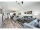 Open living room, dining area, and kitchen at 8001 Cool Breeze Dr # 121, Orlando, FL 32819