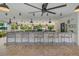 Outdoor pool bar with seating for residents at 8001 Cool Breeze Dr # 121, Orlando, FL 32819