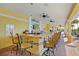 Outdoor pool bar with seating, granite counter, and large TV at 8001 Cool Breeze Dr # 121, Orlando, FL 32819