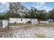 Mobile home with seating area and garden at 9151 Sw 157Th Ln, Dunnellon, FL 34432