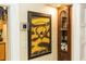 Dining room wall featuring artwork and a built-in china cabinet at 1413 Dorothy Ave, Haines City, FL 33844