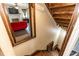 Wooden staircase leading to the upper level of the home at 1413 Dorothy Ave, Haines City, FL 33844