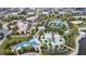 Aerial view of the community center with pools, playgrounds, and ample green spaces at 1567 Carey Palm Cir, Kissimmee, FL 34747