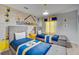 bedroom with two twin beds and Minions themed decor at 1567 Carey Palm Cir, Kissimmee, FL 34747