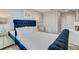 Comfortable bedroom with a plush bed, white linens, and a closet at 1567 Carey Palm Cir, Kissimmee, FL 34747