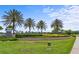 The Solara Resort entrance sign welcomes visitors with lush landscaping and palm trees at 1567 Carey Palm Cir, Kissimmee, FL 34747