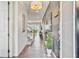 Entryway with tiled flooring, a console table, and access to the living area at 1567 Carey Palm Cir, Kissimmee, FL 34747