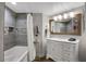 Modern bathroom with white vanity, tiled shower, and updated fixtures at 2967 S Atlantic Ave # 504, Daytona Beach Shores, FL 32118