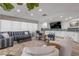 Condo community room with seating area and kitchenette at 2967 S Atlantic Ave # 504, Daytona Beach Shores, FL 32118