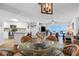 Dining area adjacent to the updated kitchen and living room at 2967 S Atlantic Ave # 504, Daytona Beach Shores, FL 32118