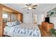 Spacious main bedroom with ocean views, a ceiling fan, and ample storage at 2967 S Atlantic Ave # 504, Daytona Beach Shores, FL 32118