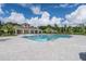 Community pool with a gazebo and plenty of space for lounging at 3541 Sandalwood Isle Way, Ocoee, FL 34761