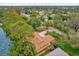 Spacious lakeside property with lush greenery and ample parking at 3966 Lake Mira Dr, Orlando, FL 32817