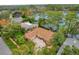 Charming lakeside home nestled among trees with a private driveway at 3966 Lake Mira Dr, Orlando, FL 32817