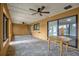 Florida room with a table, ceiling fans, and views of the backyard at 3966 Lake Mira Dr, Orlando, FL 32817