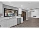 Open kitchen layout with white shaker cabinets and access to the living areas at 3966 Lake Mira Dr, Orlando, FL 32817