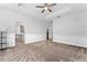 Spacious main bedroom with plush carpet and ensuite bathroom access at 438 Bogey Dr, Davenport, FL 33896