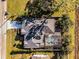 Top-down aerial view of a house with a pool and surrounding yard at 532 Maricopa Dr, Kissimmee, FL 34758