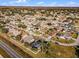 Aerial view of the house and surrounding neighborhood at 532 Maricopa Dr, Kissimmee, FL 34758