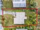 Aerial view of a single Gathering home with a yard at 6918 Ravenna Ave, Orlando, FL 32819