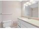 Bathroom with white vanity, toilet, and shower/tub combo at 1029 S Hiawassee Rd # 2421, Orlando, FL 32835