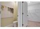 View of a bathroom with a toilet and an adjacent walk-in closet at 2105 Pigeon Plum Dr, Haines City, FL 33844