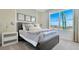 Cozy bedroom with a large window offering plenty of natural light at 2105 Pigeon Plum Dr, Haines City, FL 33844