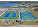 Aerial view of tennis and basketball courts, playground, and parking at 2761 Flushing Dr, Apopka, FL 32703
