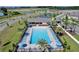 Aerial view of the community pool, clubhouse, and surrounding area at 2765 Flushing Dr, Apopka, FL 32703