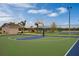 Basketball court with playground in the background at 2765 Flushing Dr, Apopka, FL 32703