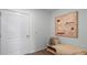 Welcoming entryway with bench seating and modern artwork at 2765 Flushing Dr, Apopka, FL 32703