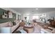 Open concept living room with view of the kitchen and dining areas at 2765 Flushing Dr, Apopka, FL 32703