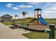 Community playground with slide, benches, and water fountain at 2765 Flushing Dr, Apopka, FL 32703