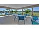 Covered cabana with tables and chairs by the community pool at 2765 Flushing Dr, Apopka, FL 32703