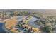 High-altitude aerial view showcasing a residential community with houses and a nearby lake at 2920 Orangebud Dr, Kissimmee, FL 34746