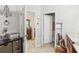 Bathroom with vanity, toilet, and view of the bedroom and closet at 2920 Orangebud Dr, Kissimmee, FL 34746