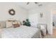 Bedroom with a bed, closet, chair, and decorative wreath at 2920 Orangebud Dr, Kissimmee, FL 34746