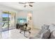 Living room with access to the patio and views of the water at 2920 Orangebud Dr, Kissimmee, FL 34746