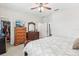 Main bedroom featuring carpeted floors and a walk-in closet at 2920 Orangebud Dr, Kissimmee, FL 34746