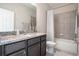 Bathroom with shower/tub combo, granite vanity, and tile flooring at 4148 Lavender Ct, Lake Hamilton, FL 33851