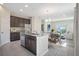 Modern kitchen with stainless steel appliances, granite counters, and an island at 4148 Lavender Ct, Lake Hamilton, FL 33851