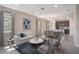 Open living area with white couch, dining table, and view of the kitchen at 4148 Lavender Ct, Lake Hamilton, FL 33851