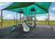 Community playground with a slide and climbing toys at 4148 Lavender Ct, Lake Hamilton, FL 33851