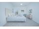 Comfortable bedroom space featuring plush carpeting and ample natural light at 473 Disa Dr, Davenport, FL 33837