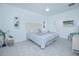 Inviting bedroom with plush carpet, ceiling fan, and large window at 473 Disa Dr, Davenport, FL 33837