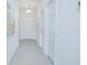 Bright and welcoming entryway with tiled flooring and white doors at 473 Disa Dr, Davenport, FL 33837