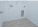Laundry room with tile flooring and hookups for washer and dryer at 473 Disa Dr, Davenport, FL 33837