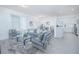 Open-concept living and dining area adjacent to the kitchen, creating a spacious feel at 473 Disa Dr, Davenport, FL 33837