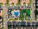 Aerial view of community pool and green space at 781 Ocean Course Ave # 601, Davenport, FL 33896